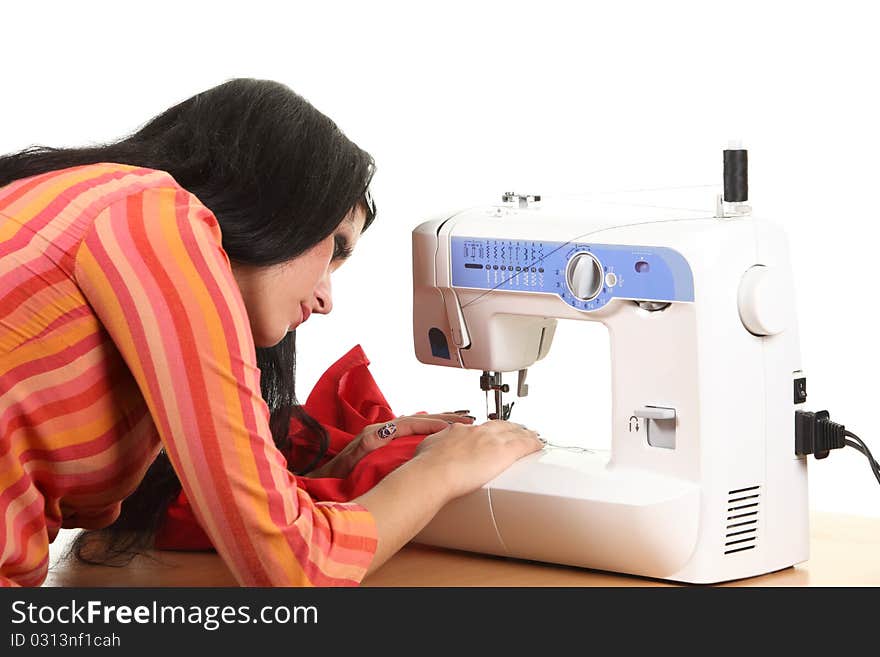 Woman seamstress work on the sewing-machine