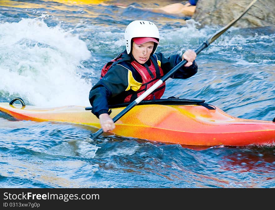 A shot of the kayaker on the rough water