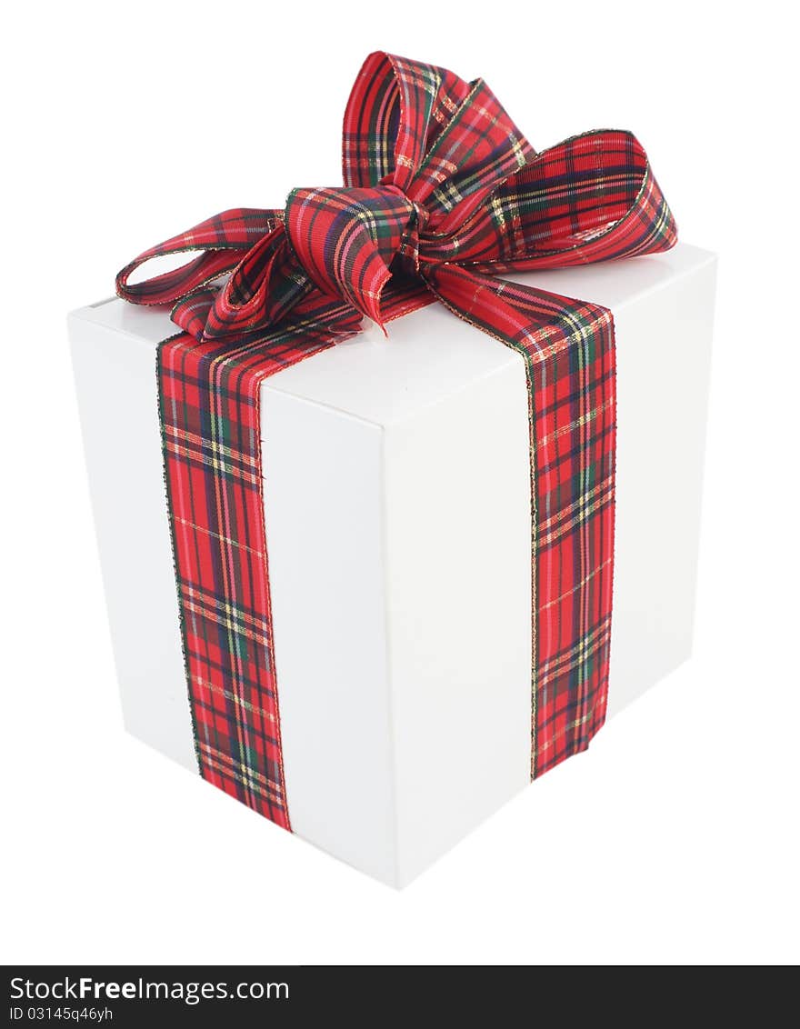 White gift box with a red bow on white background