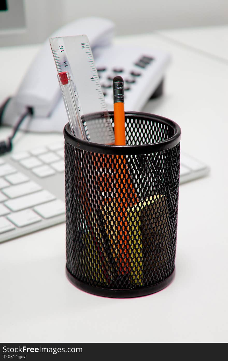 Storage compartments for pens, pencils, rubber, computer keyboard