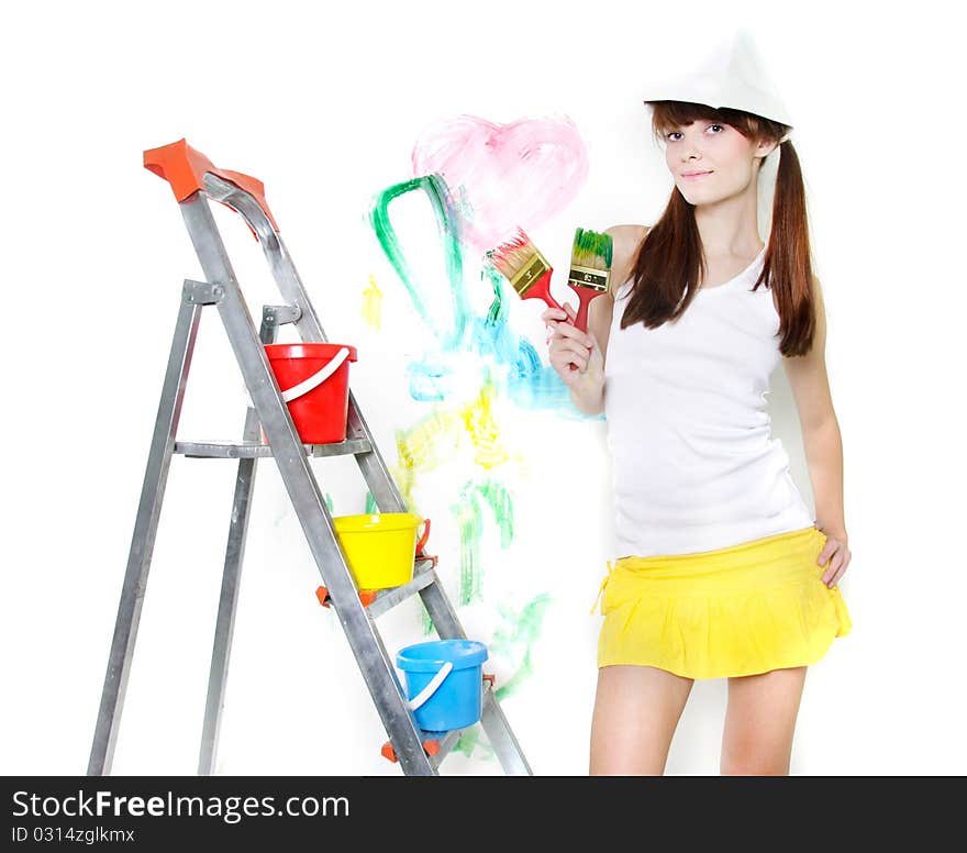 Attractive girl with paintbrush