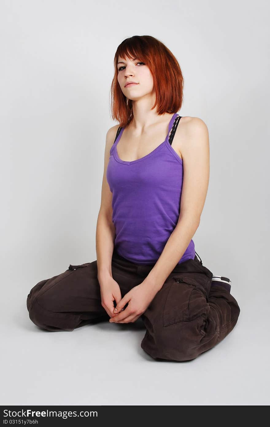 Girl In Hip-hop Clothes Sitting