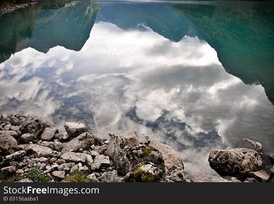 This picture was taken in Norway, in Glacier Berixdl during Norway's amazing autumn with yellow flowers background. This picture was taken in Norway, in Glacier Berixdl during Norway's amazing autumn with yellow flowers background