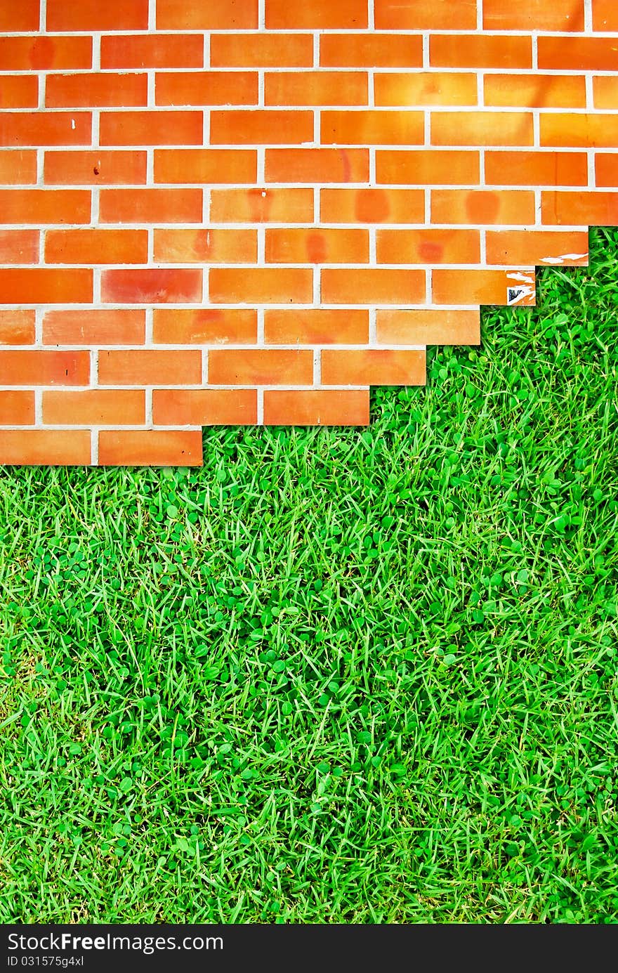 Brick wall fence and grass field background texture