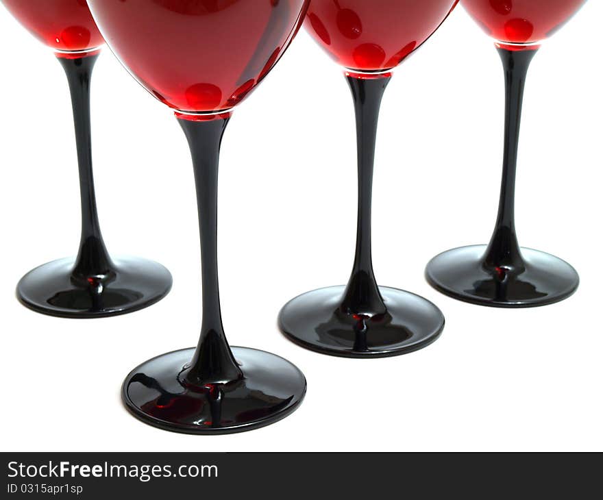 Rose wine in a wine glass isolated on white background