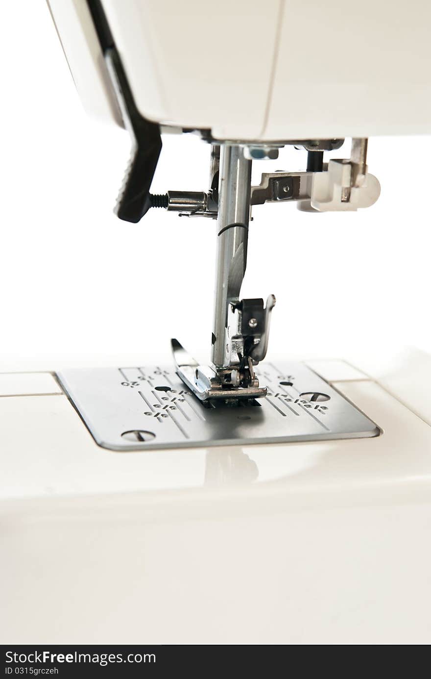 Sewing machine on white background. Details. Sewing machine on white background. Details