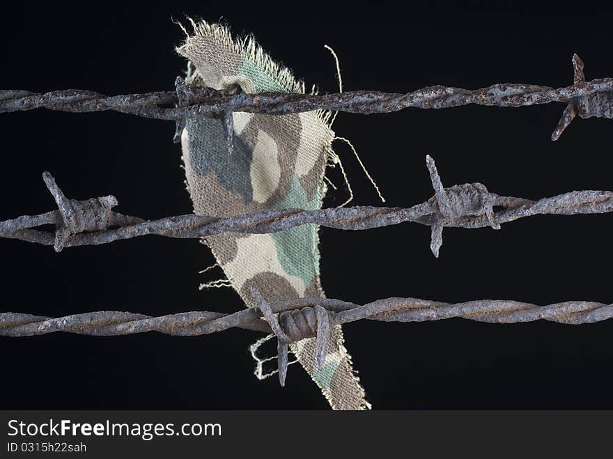 Three rusty barbed wire on black background