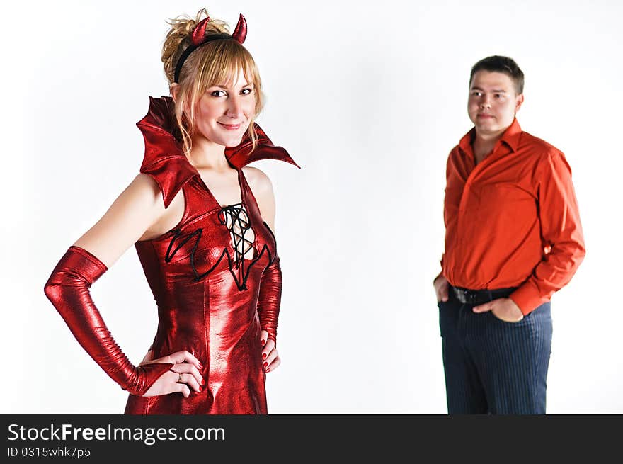 Red devil couple on white background