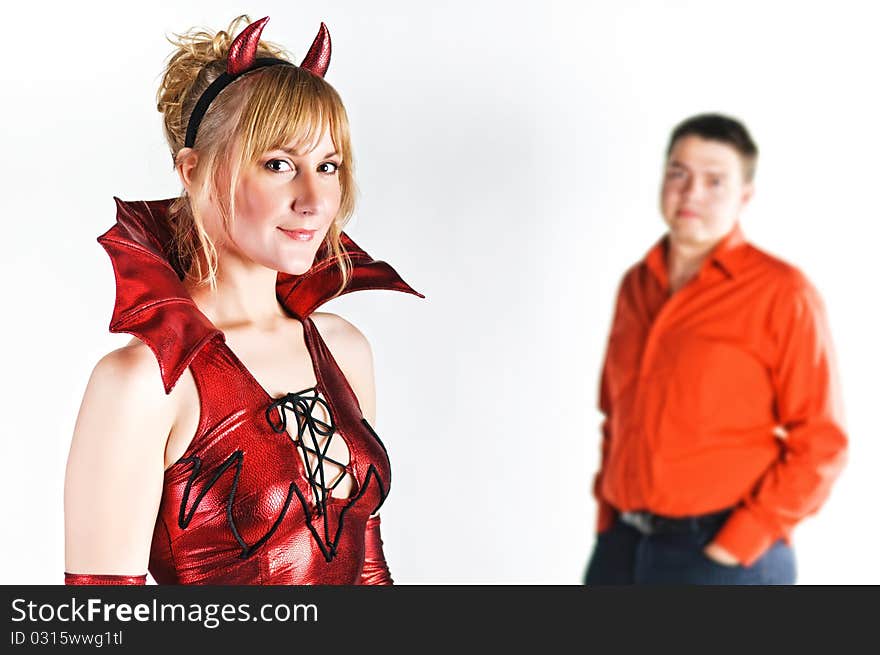 Red devil couple on white background