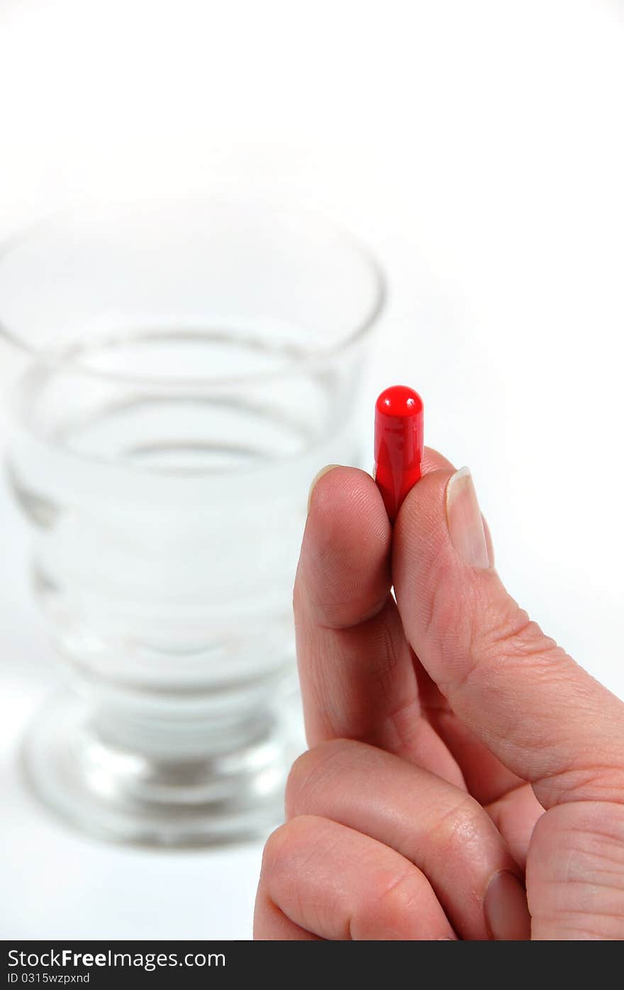 it photographs of first capsule plane and glass of water with white bottom