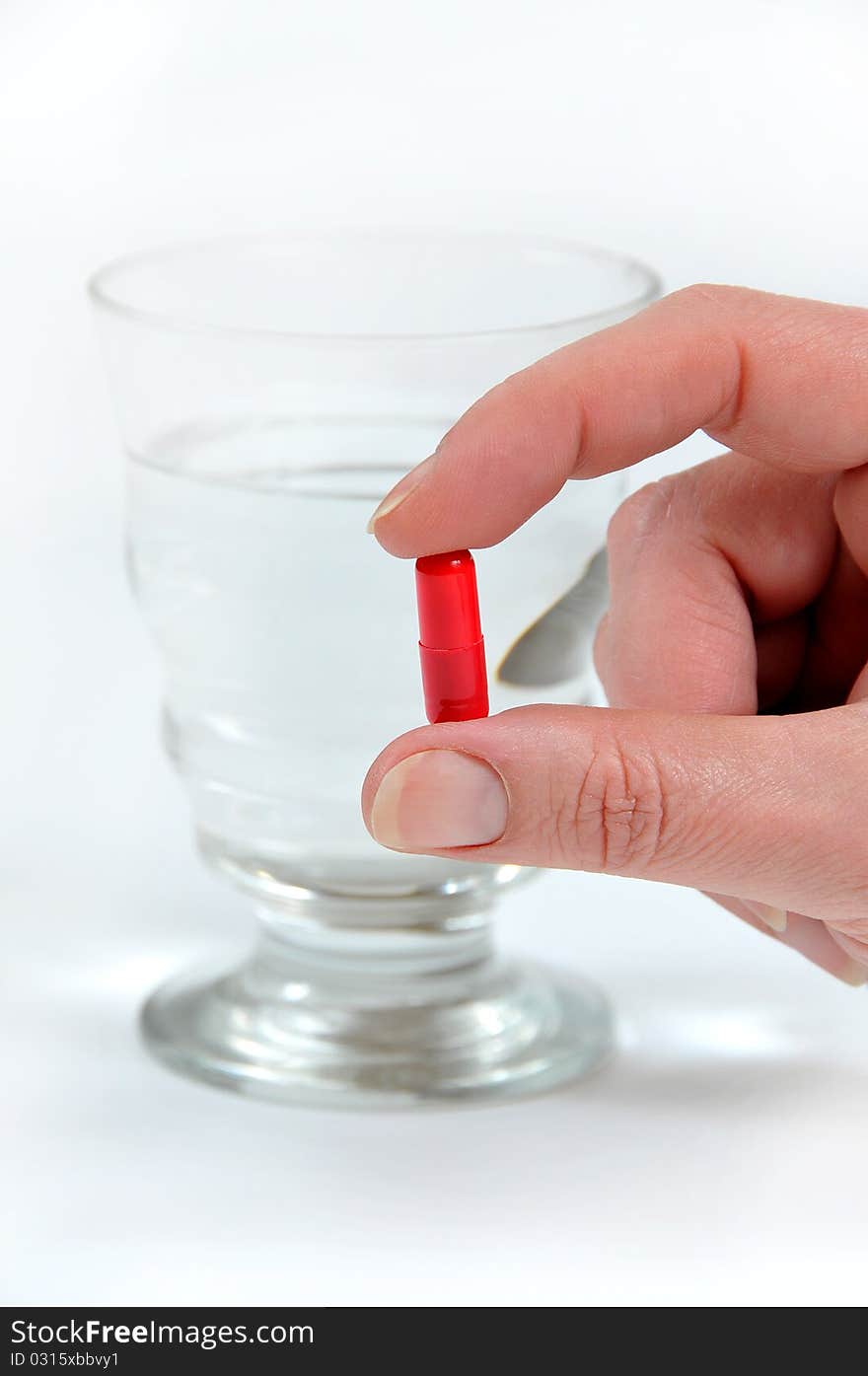 it photographs of first capsule plane and glass of water with white bottom