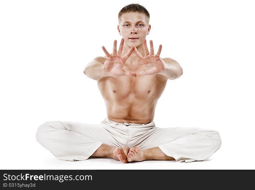 Bodybuilder isolated on the white background. Bodybuilder isolated on the white background