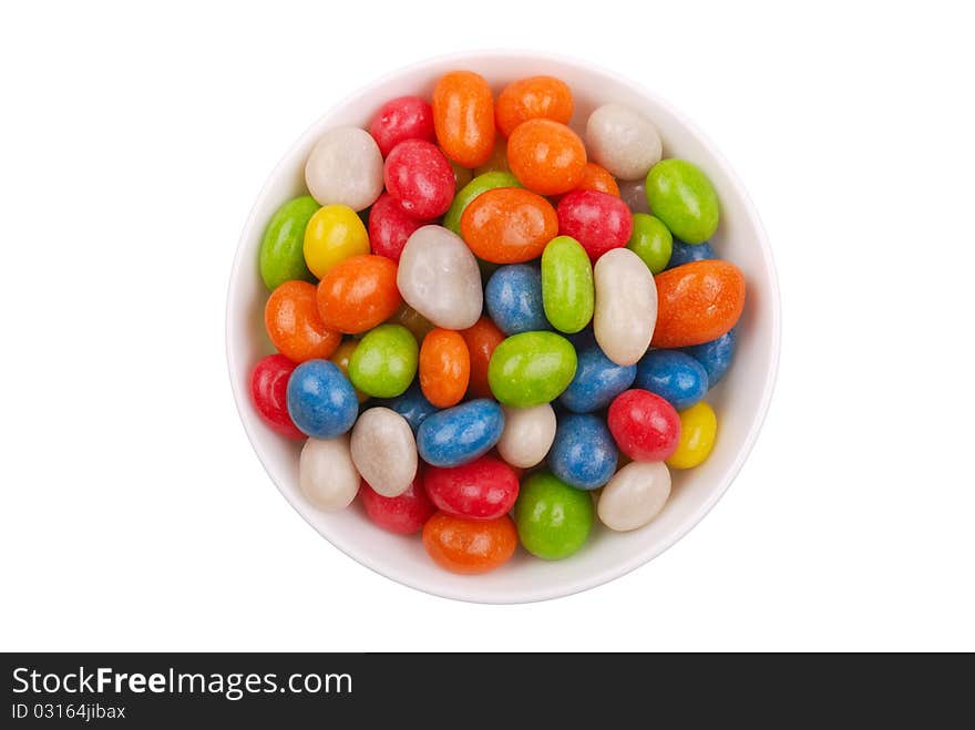 Multicolored sweets covered with glaze on a plate