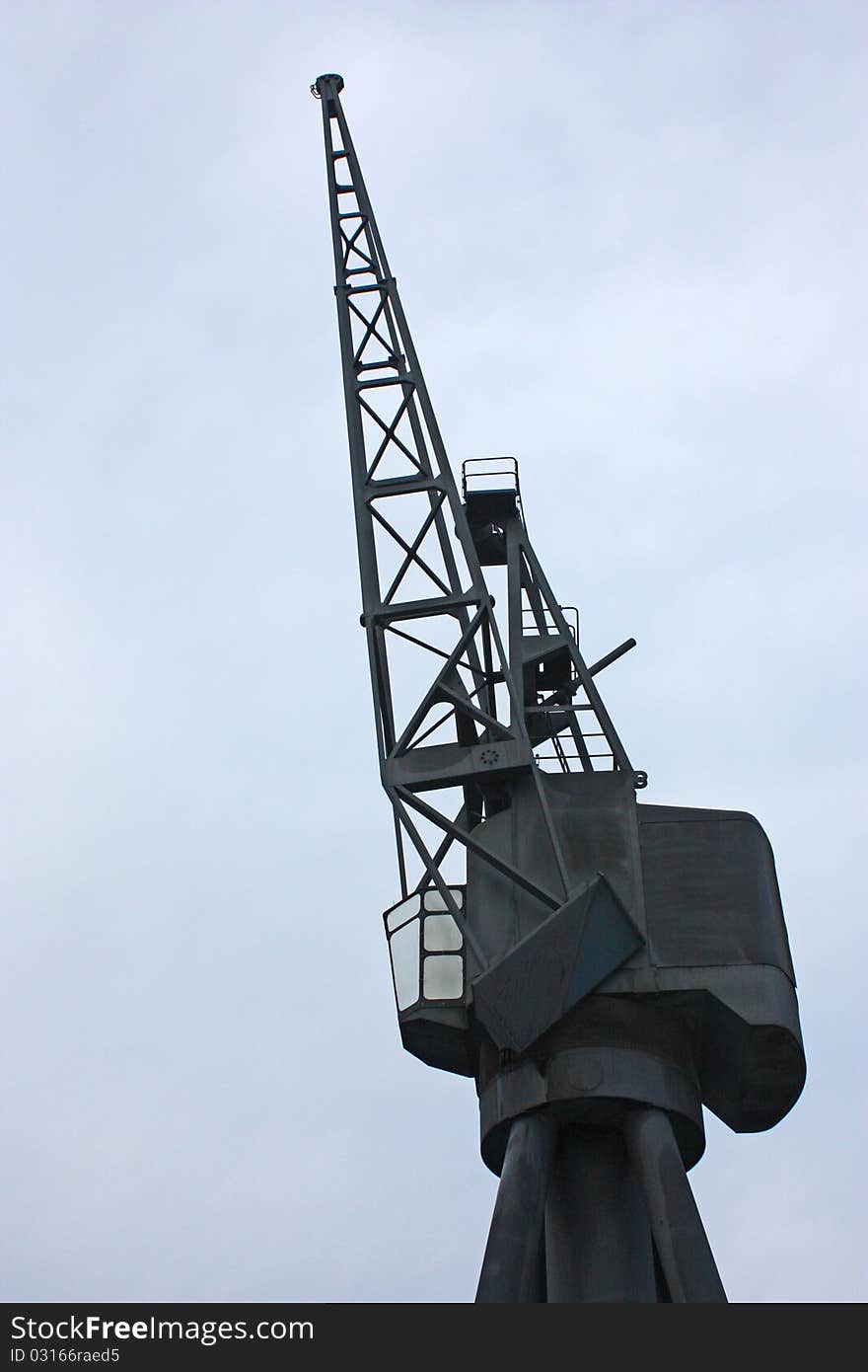 A View of a Traditional Dockside Crane from the Side.