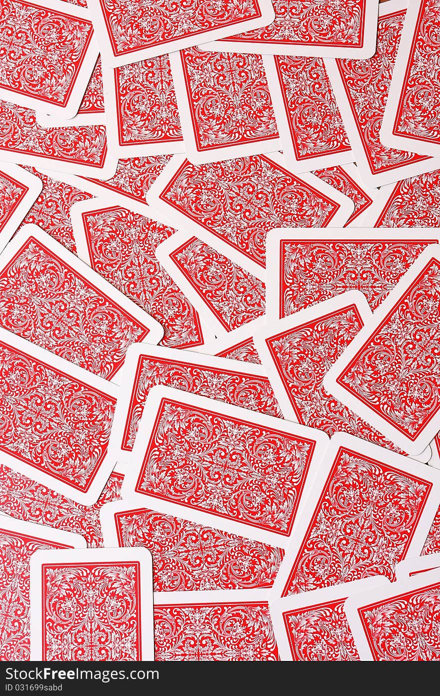 Scattered playing cards background on playing table