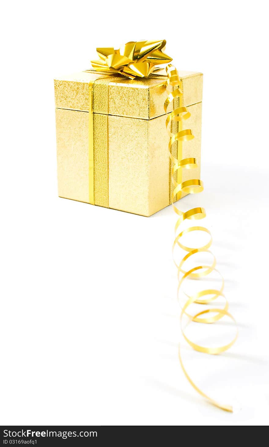 Christmas golden gift-box on white background, with golden ribbon