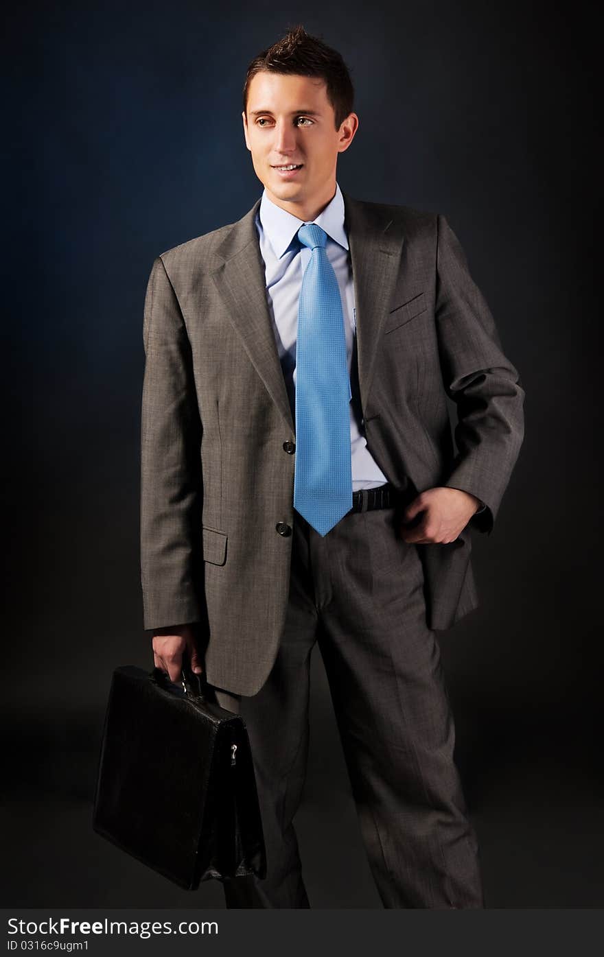 Young Businessman With A Portfolio