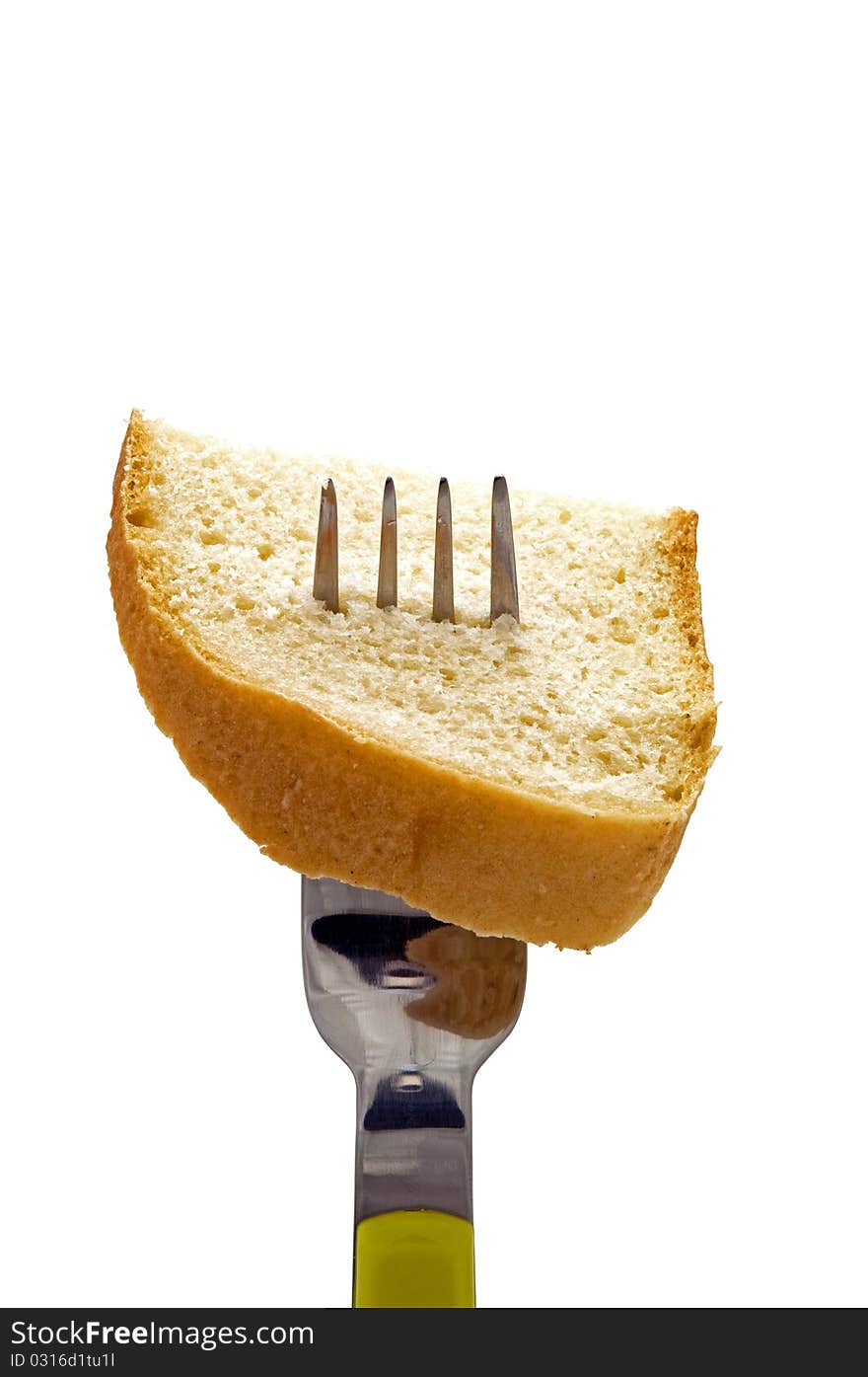 Piece of bread on the fork isolated white