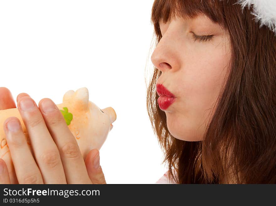 The Christmas woman with a piggy bank