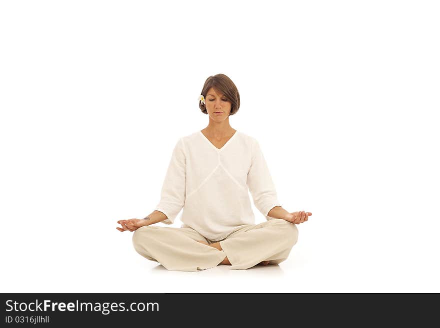 Young woman doing yoga exercises