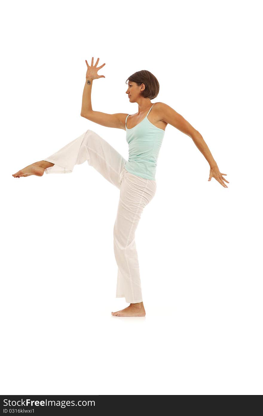 Young woman doing yoga exercises