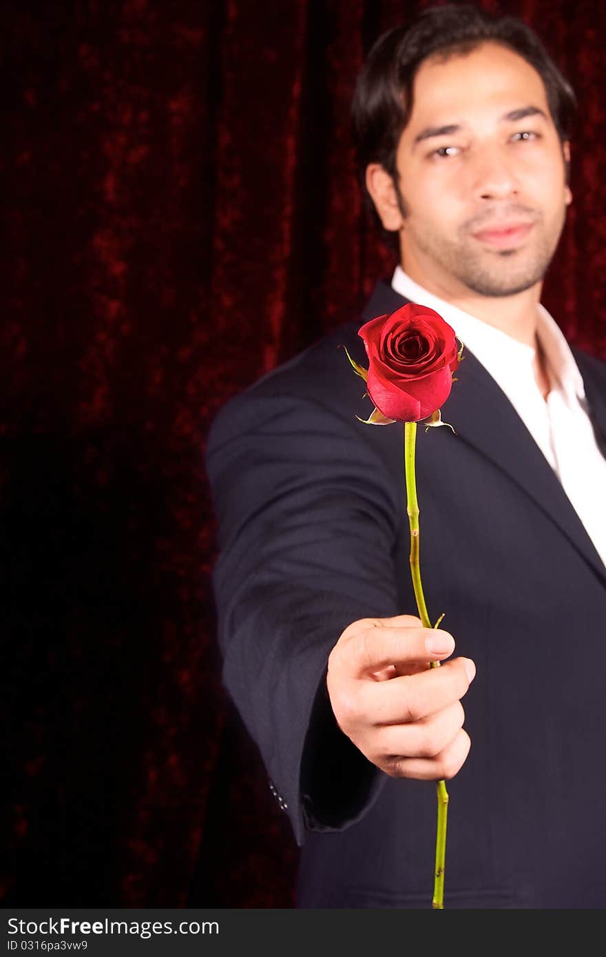 Man offering rose