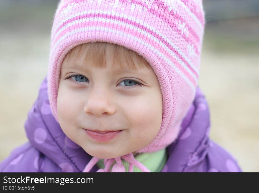 Adorable little girl looking  at the camera