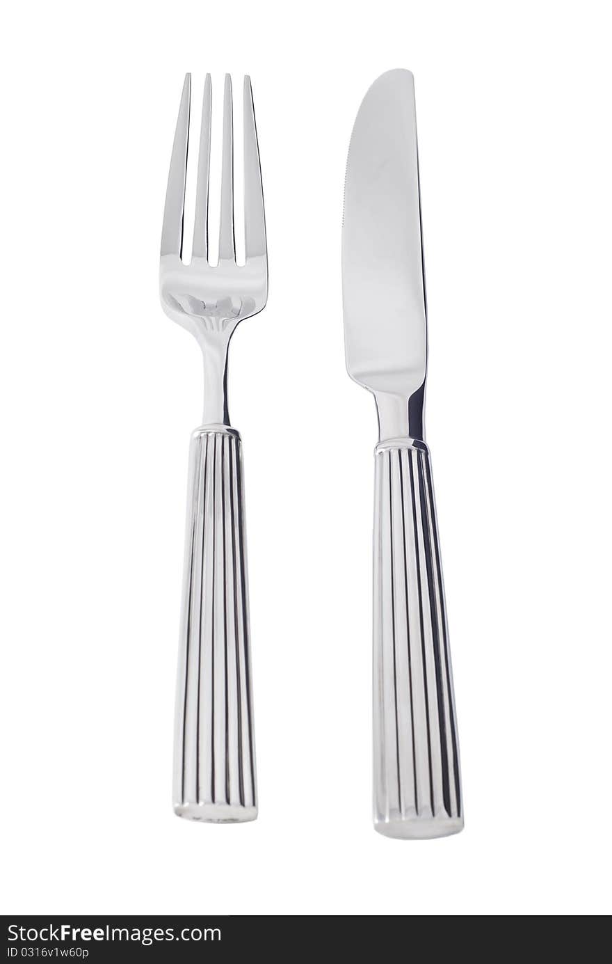 Cutlery lying on a white background