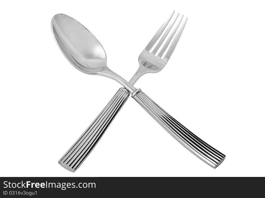 Cutlery lying on a white background