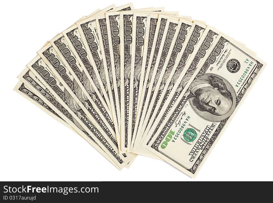 Hundreds of dollars spread on white background