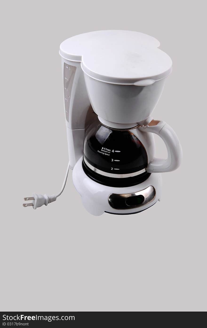 A white small four cup coffeemaker, with coffee in, for light gray background. A white small four cup coffeemaker, with coffee in, for light gray background.