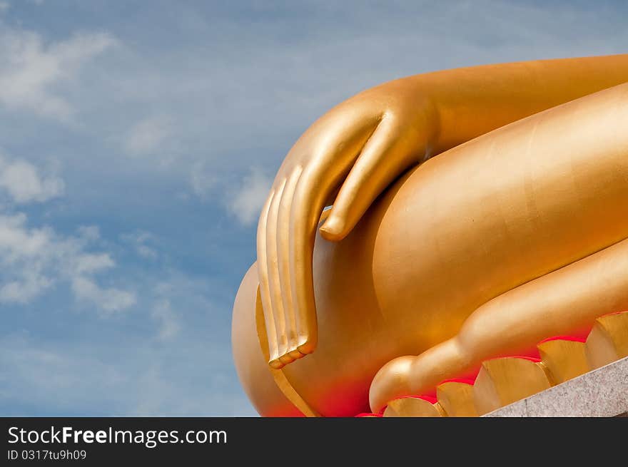 The buddha hand statue in blue sky