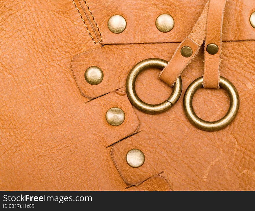 Leather red background with rivets at the side