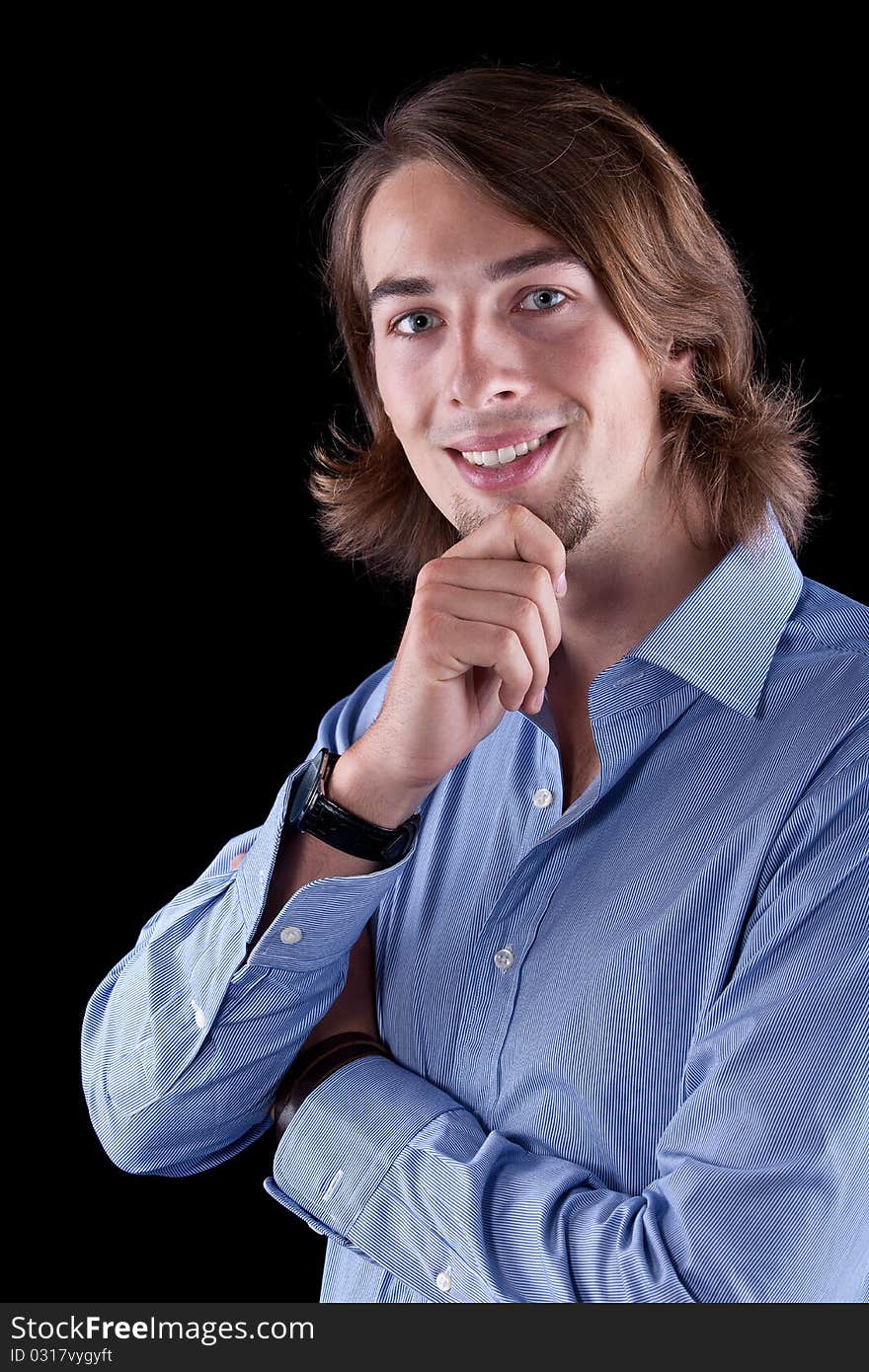 Young fresh business man with long hair - European. Young fresh business man with long hair - European.