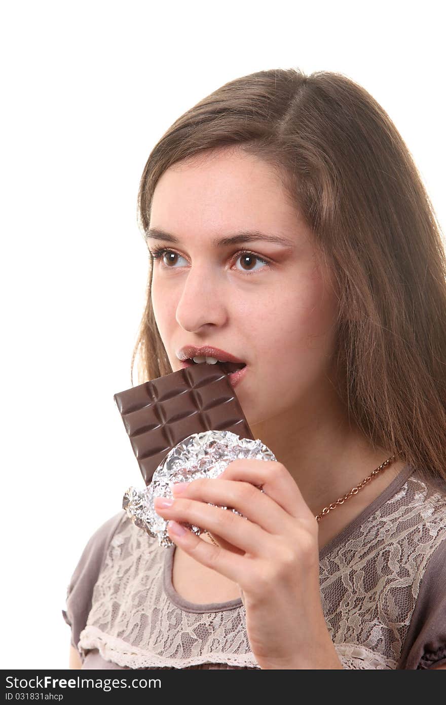 Young attractive woman eat chocolate