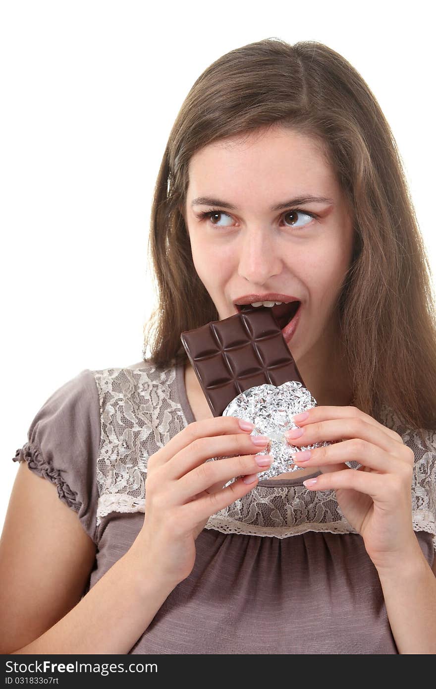 Young attractive woman eat chocolate