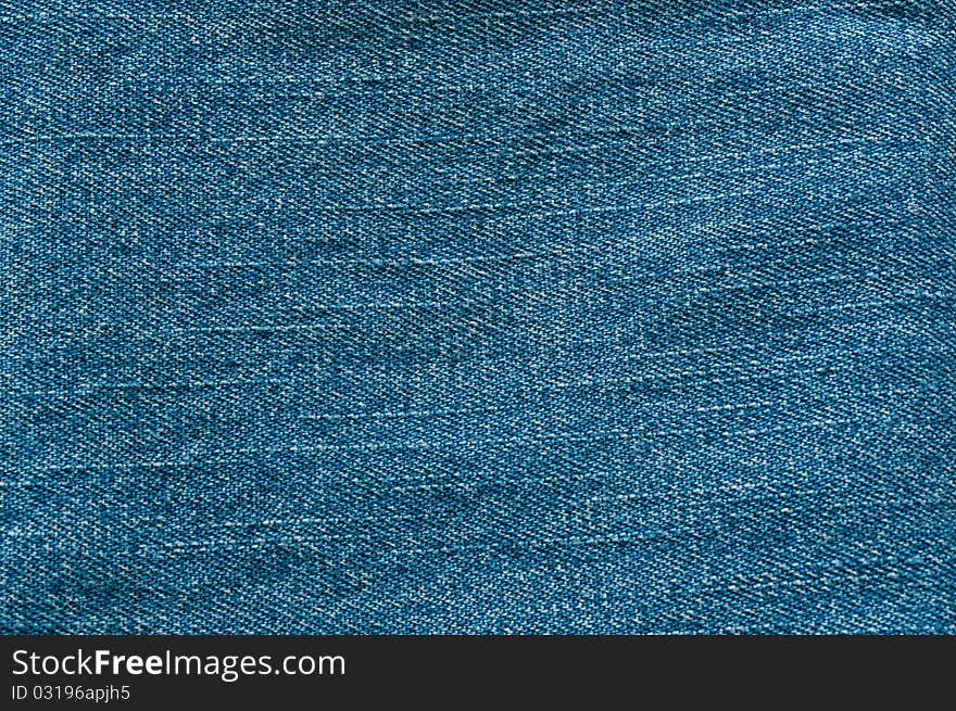 A section of a jeans. Usable ace background