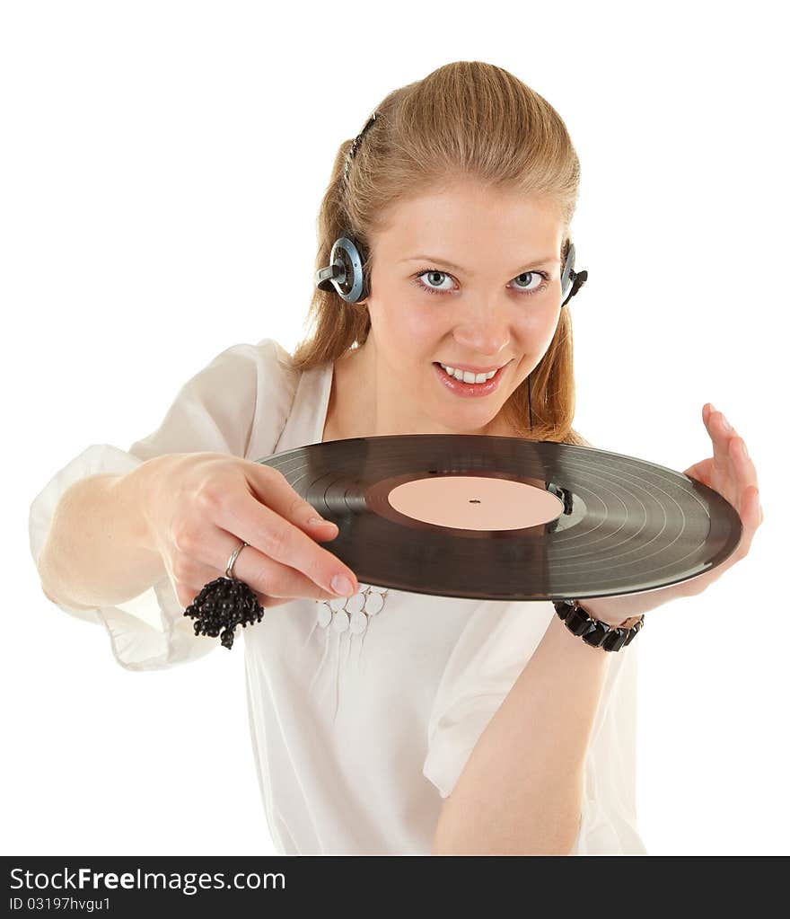 Young girl with a vinyl record and headphones. Young girl with a vinyl record and headphones