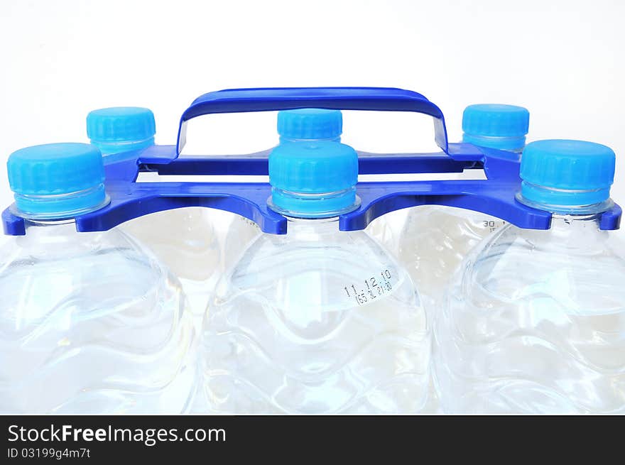 Close up of water bottles over white background