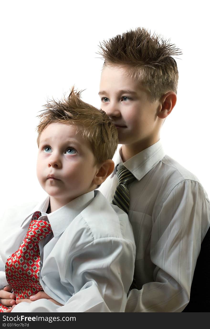 Portrait of two brothers isolated on white background