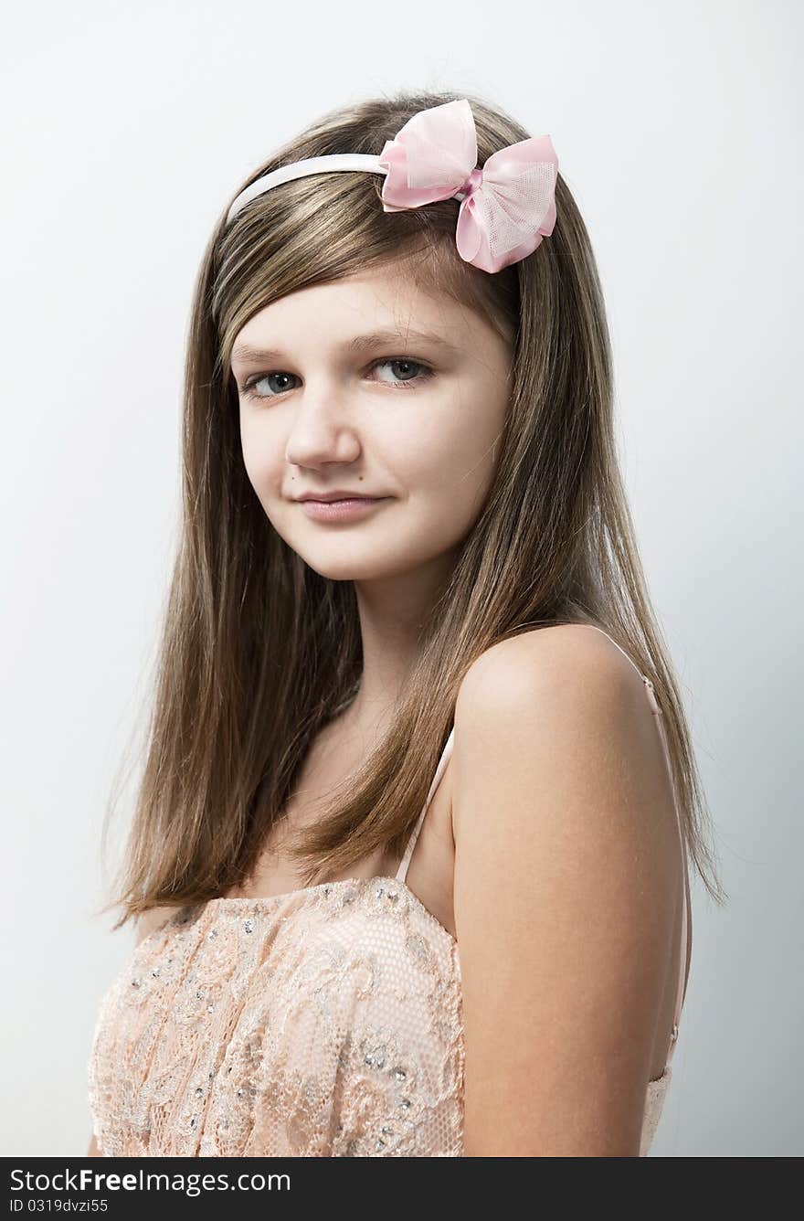 Fashion portrait of lovely young teenage girl indoors