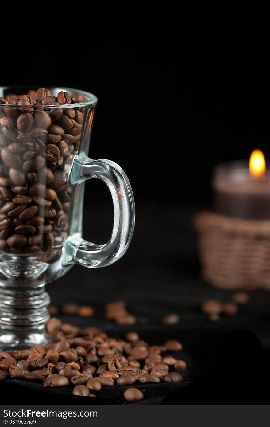 Coffee Beans And Burning Candle