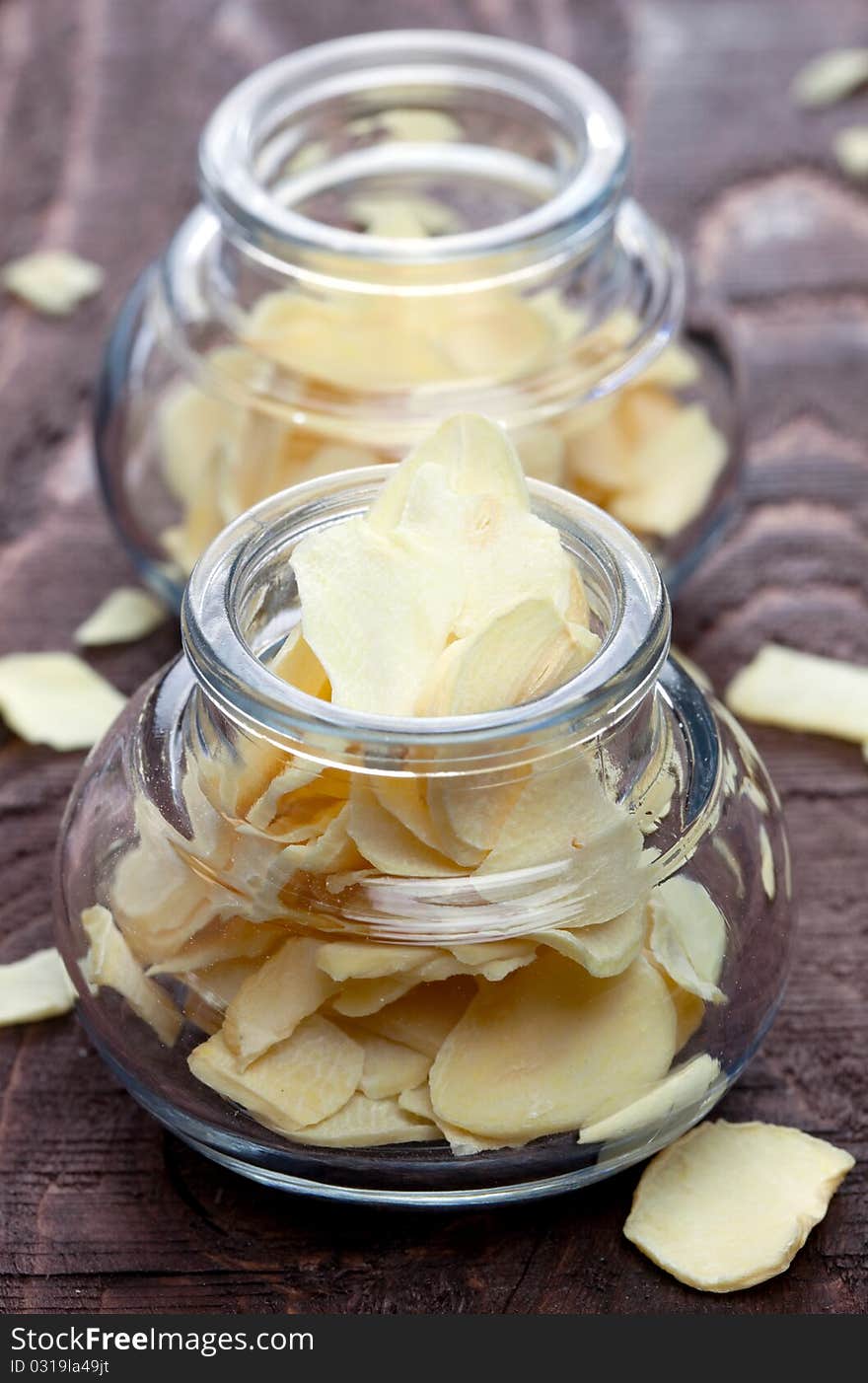 Garlic flakes in a glass