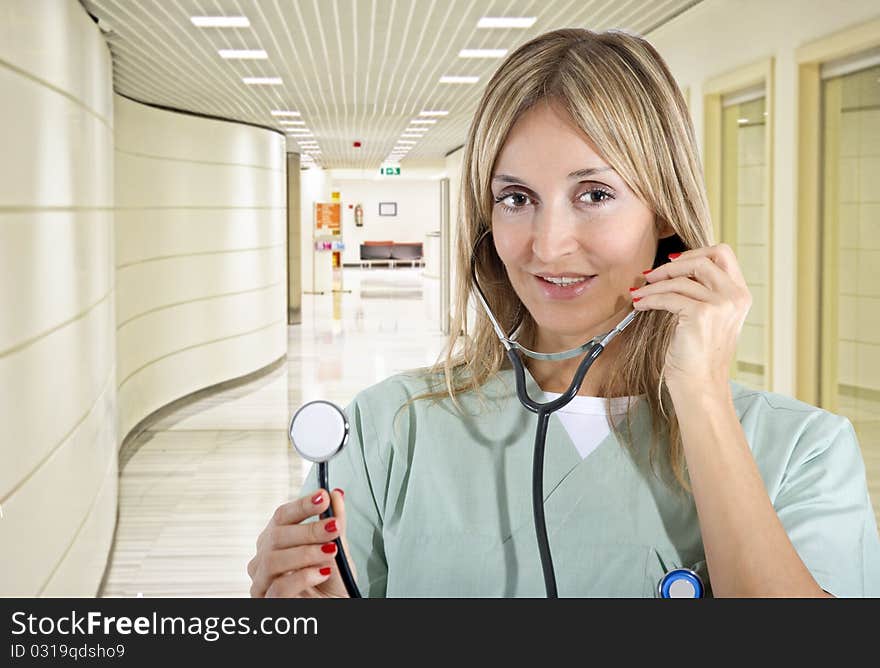 Smiling confident medical staff in her uniform. Smiling confident medical staff in her uniform