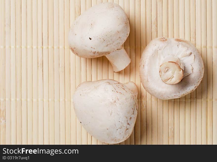 White mushrooms on a plate