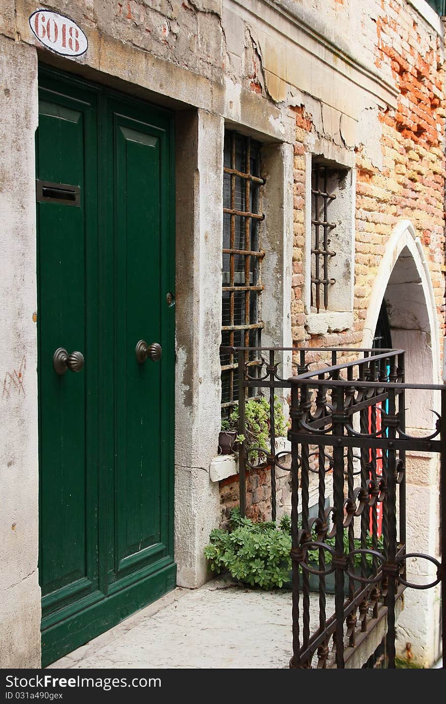 View of the old green door (Mediterranean architecture). View of the old green door (Mediterranean architecture)