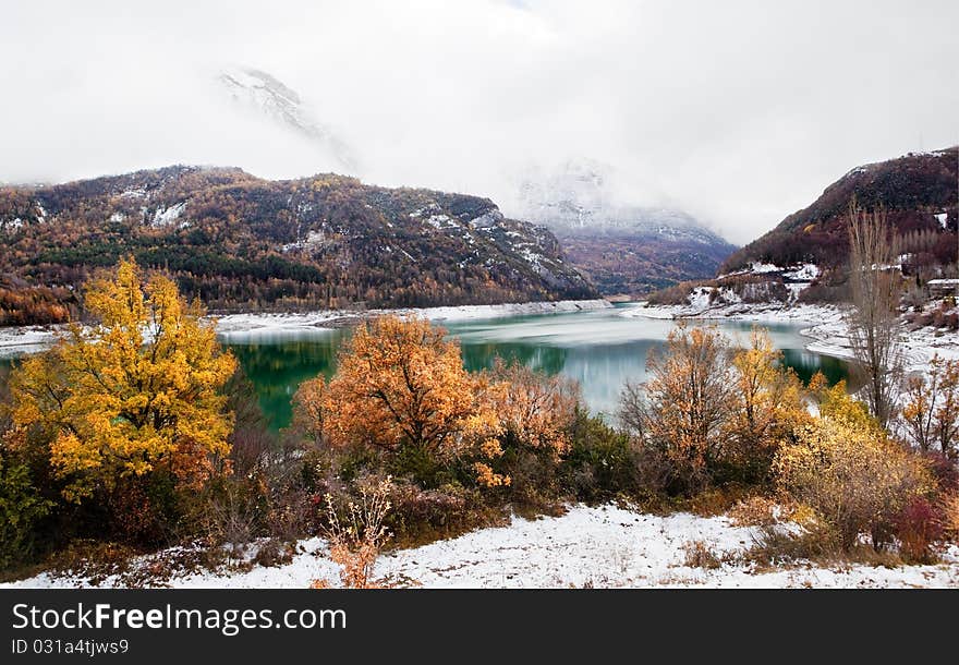 Snowy mountain landscape and marsh. Snowy mountain landscape and marsh