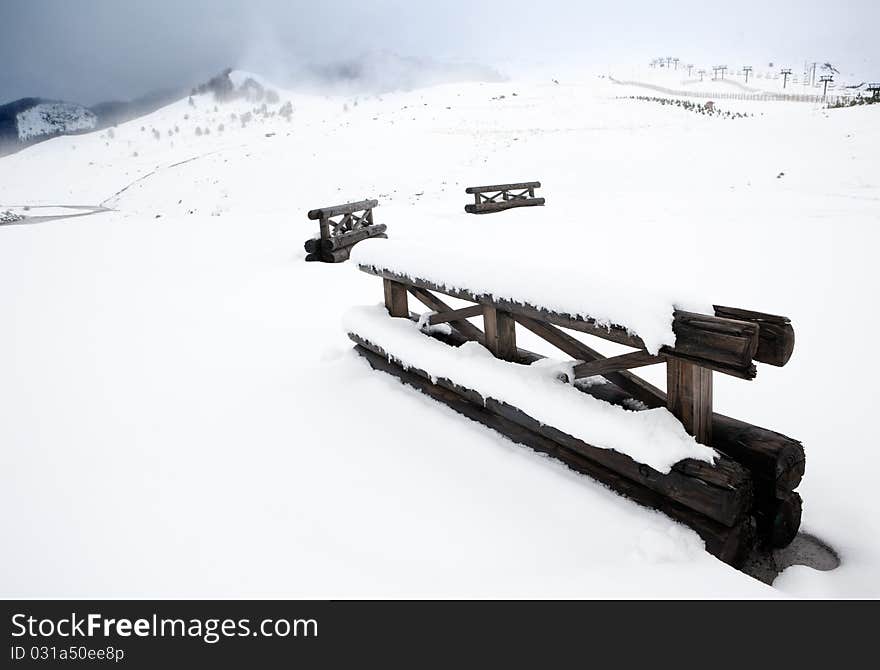 Details of fences in snowy winter landscape