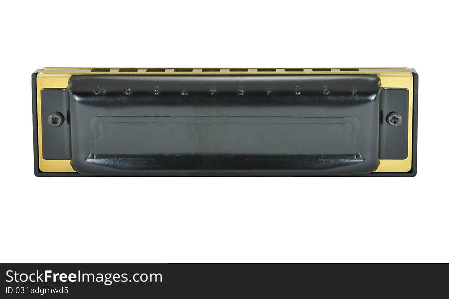 A black and brass blues harp isolated on a white background. The Blues harp is used in Blues music and sometimes in Country music. A black and brass blues harp isolated on a white background. The Blues harp is used in Blues music and sometimes in Country music.