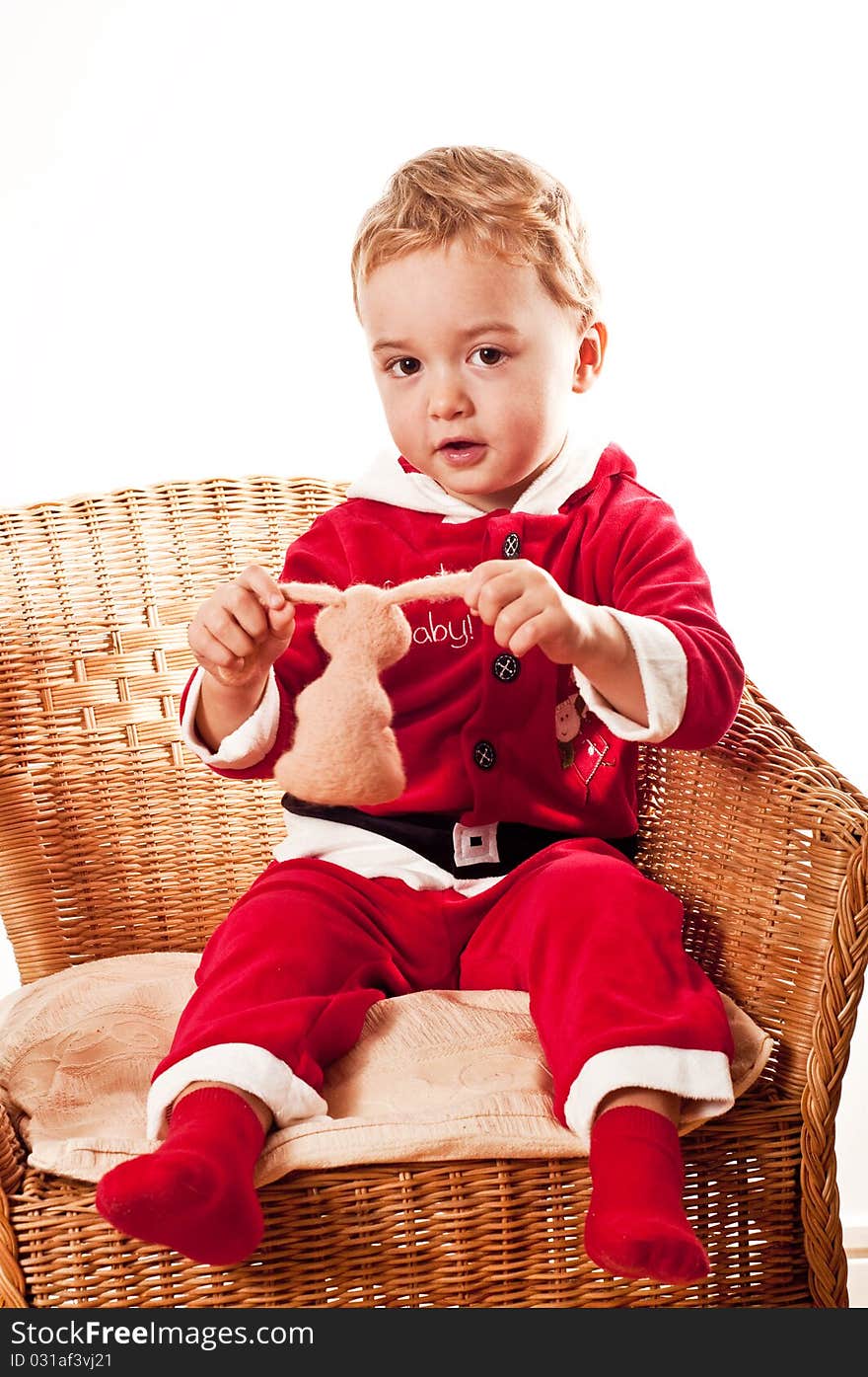 Santa boy with rabbit toy. Santa boy with rabbit toy